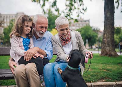 Grandparents with Granddaughter and Dog